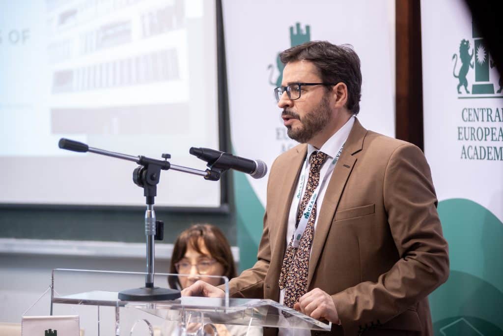 Male speaker at the CEA podium addressing the audience