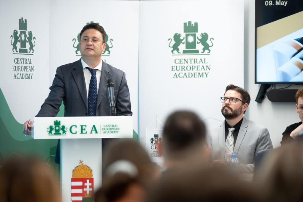 Male speaker at the CEA podium addressing the audience