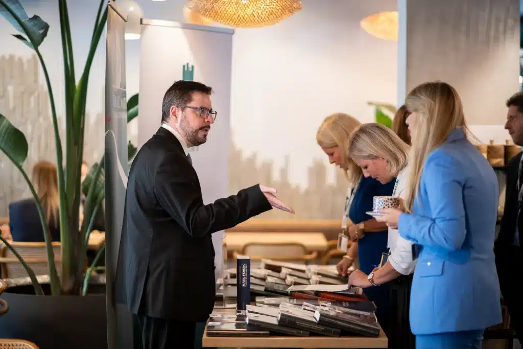 Man and woman talking during the event break