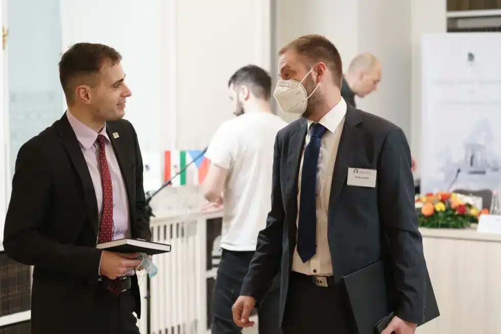 Participants talking during the conference break
