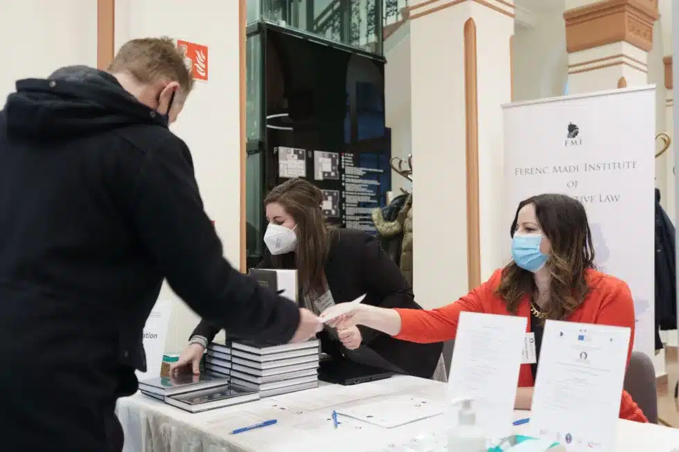 Participants registering at the conference