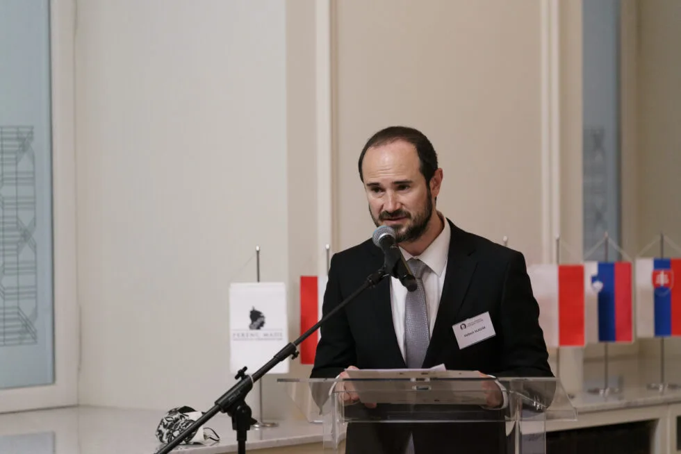 Man giving a speech at the podium