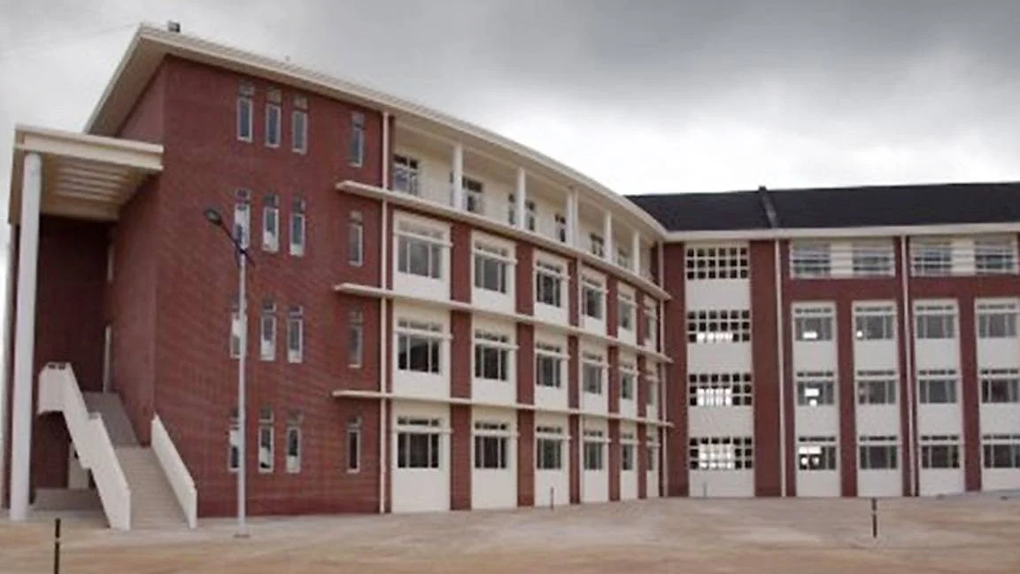 Neoclassical university building with a columned façade.
