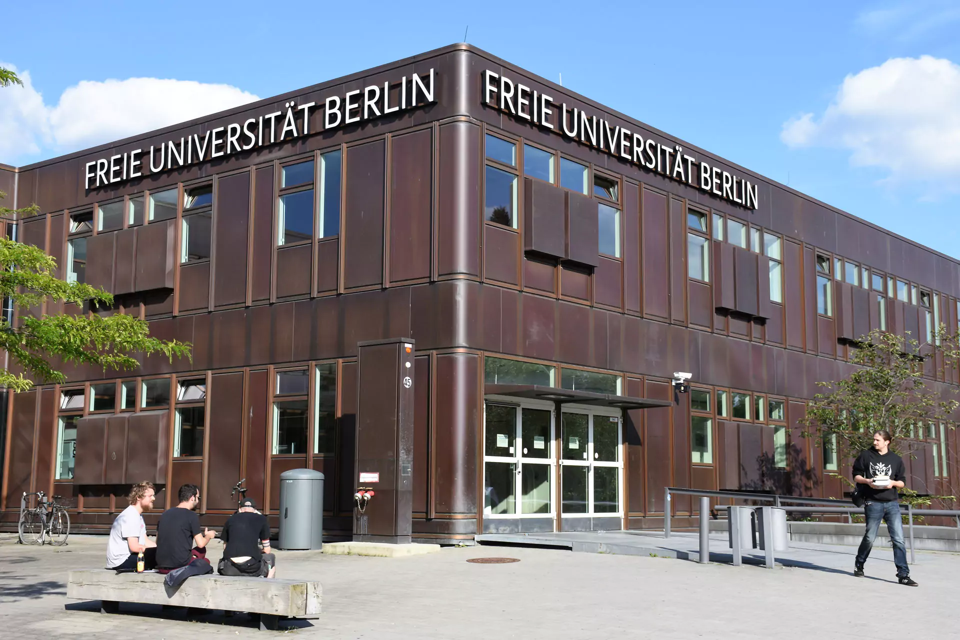 Contemporary university building with wooden and glass façade