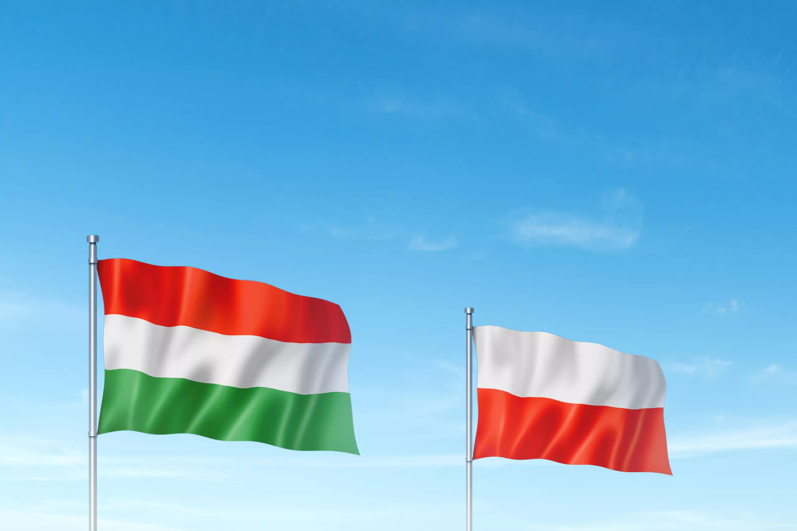 Hungarian and Polish flags next to each other