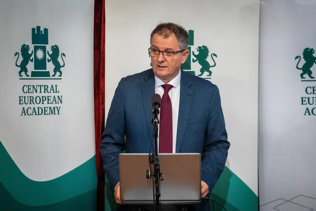 Male speaker at the CEA podium addressing the audience