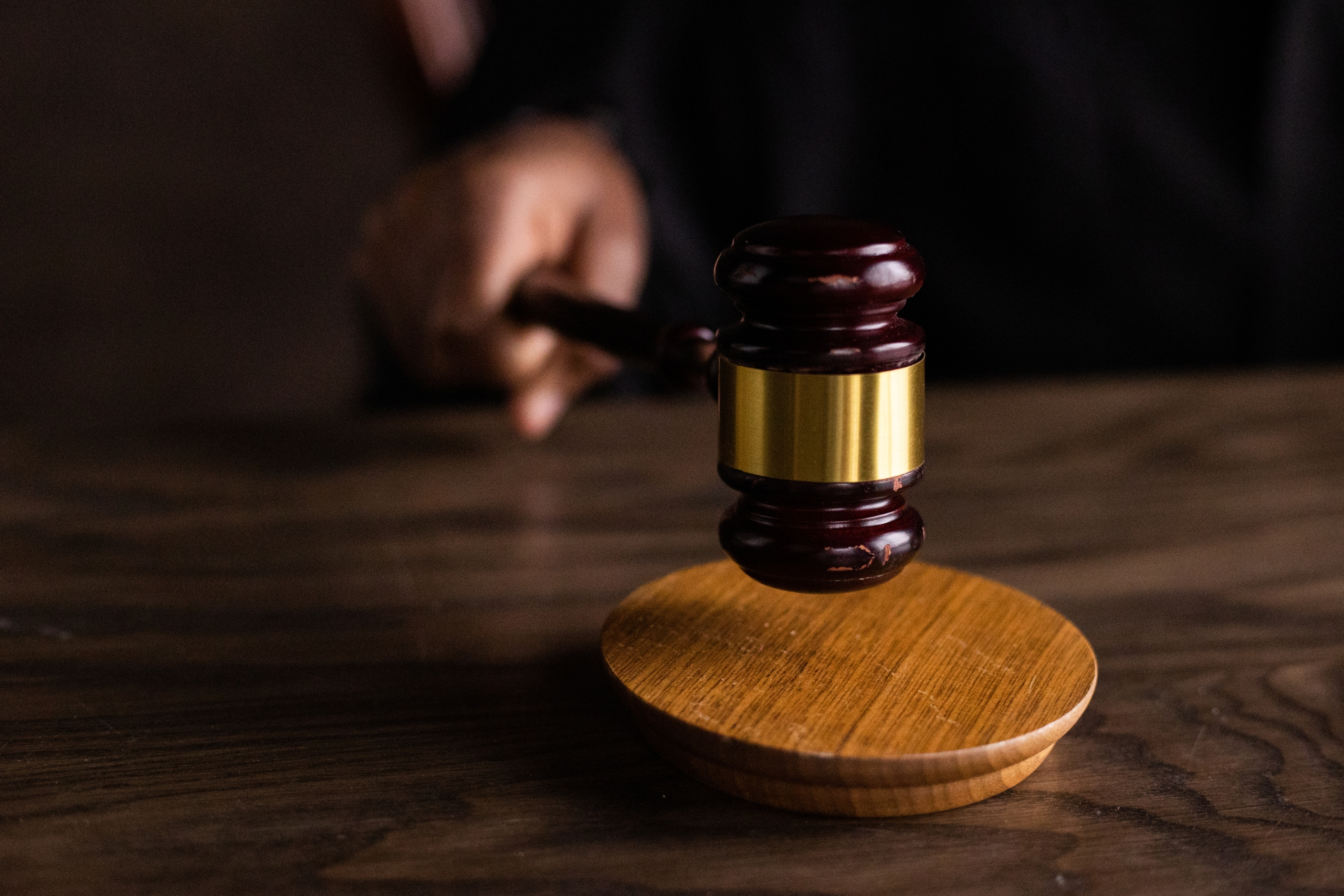 Judge’s gavel on a dark background