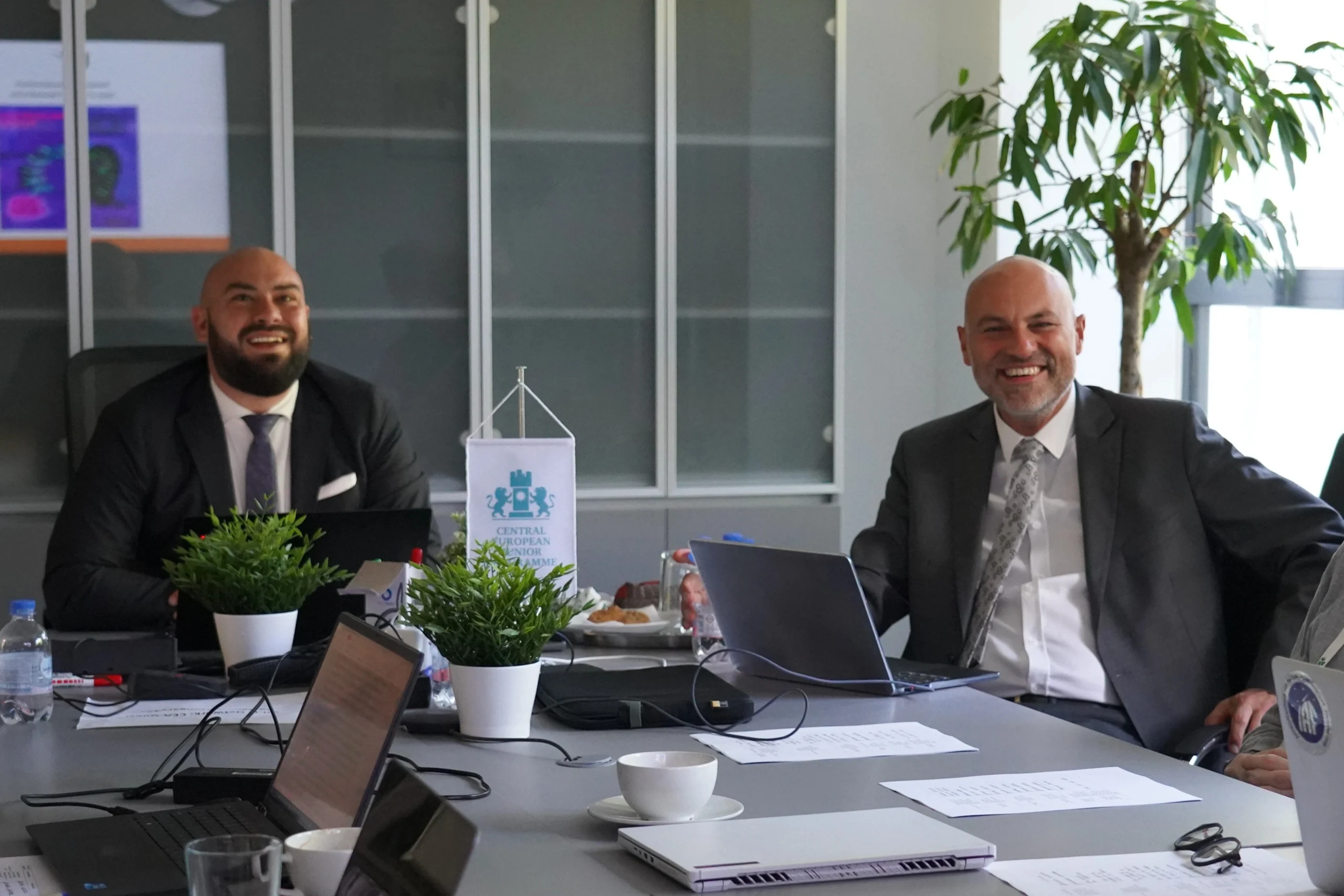 Meeting at the CEA conference table with participants